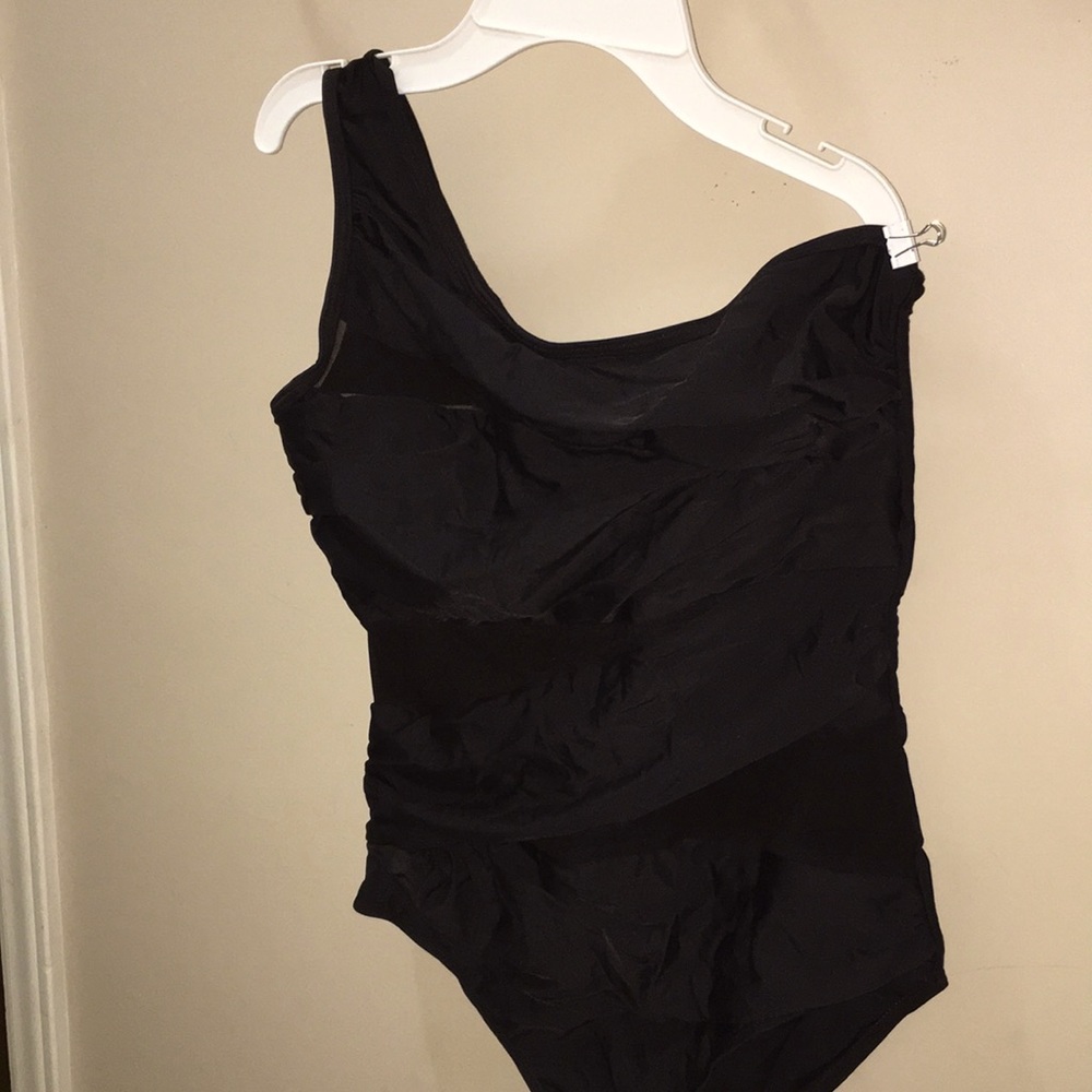 One piece shirted swimsuit, one shoulder